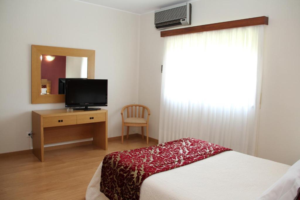 Hotel Chale Paredes Rum bild